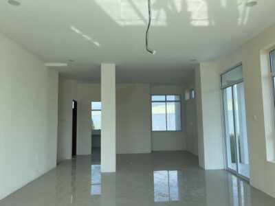 Kitang Heights two storey intermediate terrace house with sub-basement.