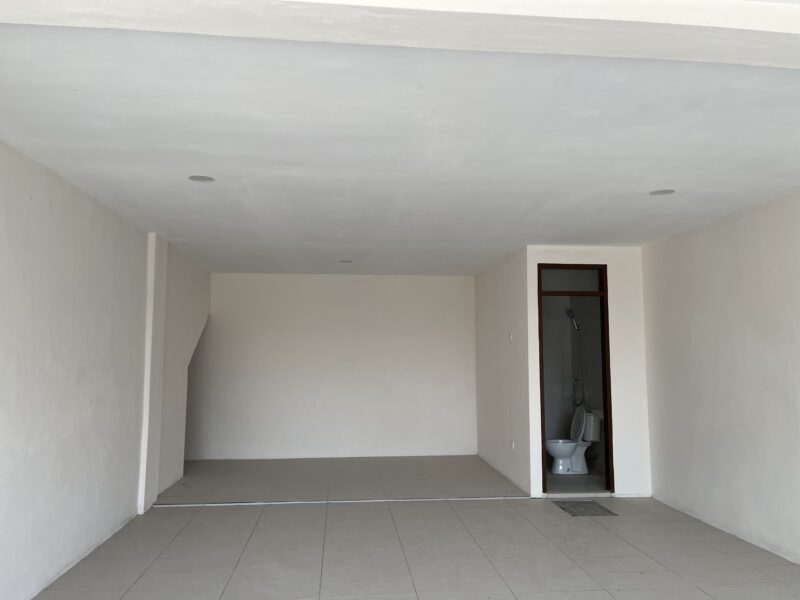 Kitang Heights two storey intermediate terrace house with sub-basement.